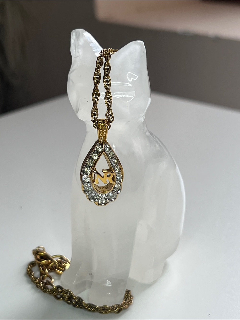 Nina Ricci Gold-Tone Teardrop Pendant Necklace with Clear Crystals